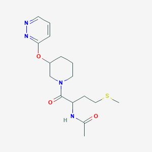 N-(4-(methylthio)-1-oxo-1-(3-(pyridazin-3-yloxy)piperidin-1-yl)butan-2-yl)acetamide