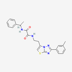 N1-(1-phenylethyl)-N2-(2-(2-(m-tolyl)thiazolo[3,2-b][1,2,4]triazol-6-yl)ethyl)oxalamide