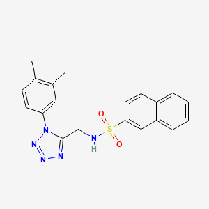 molecular formula C20H19N5O2S B2520702 N-((1-(3,4-dimethylphenyl)-1H-tetrazol-5-yl)methyl)naphthalene-2-sulfonamide CAS No. 942000-17-1