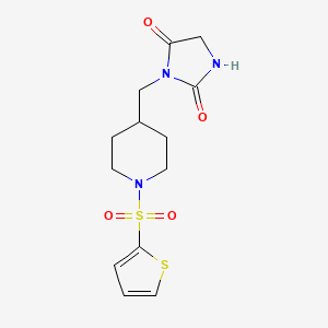 molecular formula C13H17N3O4S2 B2521160 3-((1-(Thiophen-2-ylsulfonyl)piperidin-4-yl)methyl)imidazolidine-2,4-dione CAS No. 1421497-46-2