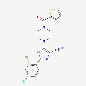 2-(2,4-Dichlorophenyl)-5-(4-(thiophene-2-carbonyl)piperazin-1-yl)oxazole-4-carbonitrile