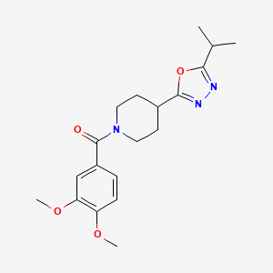 molecular formula C19H25N3O4 B2522711 (3,4-Dimethoxyphenyl)(4-(5-isopropyl-1,3,4-oxadiazol-2-yl)piperidin-1-yl)methanone CAS No. 1209051-08-0
