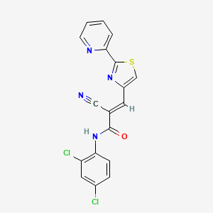 molecular formula C18H10Cl2N4OS B2522856 (E)-2-cyano-N-(2,4-dichlorophenyl)-3-(2-pyridin-2-yl-1,3-thiazol-4-yl)prop-2-enamide CAS No. 1181484-03-6
