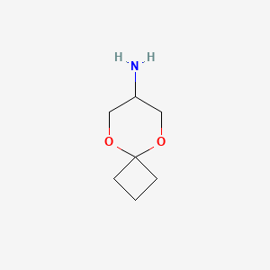 molecular formula C7H13NO2 B2525261 5,9-Dioxaspiro[3.5]nonan-7-amine CAS No. 2418670-13-8