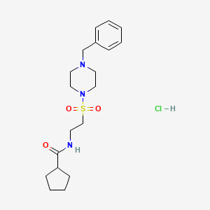 molecular formula C19H30ClN3O3S B2526045 N-(2-((4-benzylpiperazin-1-yl)sulfonyl)ethyl)cyclopentanecarboxamide hydrochloride CAS No. 1189730-57-1