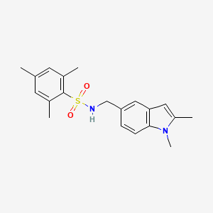 molecular formula C20H24N2O2S B2526189 N-[(1,2-dimethylindol-5-yl)methyl]-2,4,6-trimethylbenzenesulfonamide CAS No. 852139-30-1
