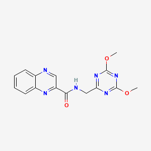 molecular formula C15H14N6O3 B2526830 N-((4,6-dimethoxy-1,3,5-triazin-2-yl)methyl)quinoxaline-2-carboxamide CAS No. 2034465-55-7