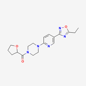 molecular formula C18H23N5O3 B2527593 (4-(5-(5-Ethyl-1,2,4-oxadiazol-3-yl)pyridin-2-yl)piperazin-1-yl)(tetrahydrofuran-2-yl)methanone CAS No. 1235280-83-7