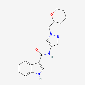 molecular formula C18H20N4O2 B2528327 N-(1-((tetrahydro-2H-pyran-2-yl)methyl)-1H-pyrazol-4-yl)-1H-indole-3-carboxamide CAS No. 2034557-10-1