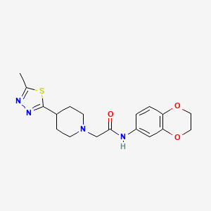 molecular formula C18H22N4O3S B2528716 N-(2,3-dihydrobenzo[b][1,4]dioxin-6-yl)-2-(4-(5-methyl-1,3,4-thiadiazol-2-yl)piperidin-1-yl)acetamide CAS No. 1323550-41-9