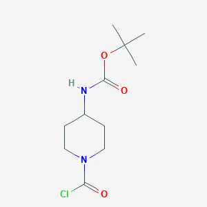 molecular formula C11H19ClN2O3 B2529084 tert-ブチル N-(1-クロロカルボニルピペリジン-4-イル)カルバメート CAS No. 2231279-64-2