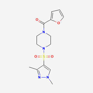 molecular formula C14H18N4O4S B2529346 4-[(1,3-Dimethylpyrazol-4-yl)sulfonyl]piperazinyl 2-furyl ketone CAS No. 1005879-90-2
