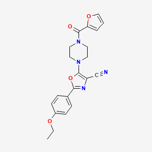 2-(4-Ethoxyphenyl)-5-(4-(furan-2-carbonyl)piperazin-1-yl)oxazole-4-carbonitrile