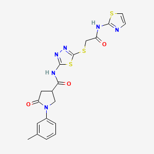 molecular formula C19H18N6O3S3 B2532272 5-氧代-N-(5-((2-氧代-2-(噻唑-2-氨基)乙基)硫代)-1,3,4-噻二唑-2-基)-1-(间甲苯基)吡咯烷-3-甲酰胺 CAS No. 872595-01-2