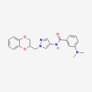 molecular formula C21H22N4O3 B2533573 N-{1-[(2,3-dihidro-1,4-benzodioxin-2-il)metil]-1H-pirazol-4-il}-3-(dimetilamino)benzamida CAS No. 1795418-94-8