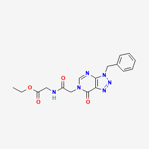 molecular formula C17H18N6O4 B2533852 2-[[2-(3-苄基-7-氧代三唑并[4,5-d]嘧啶-6-基)乙酰]氨基]乙酸乙酯 CAS No. 892469-33-9