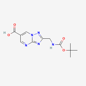 molecular formula C12H15N5O4 B2534532 2-[[(2-Methylpropan-2-yl)oxycarbonylamino]methyl]-[1,2,4]triazolo[1,5-a]pyrimidine-6-carboxylic acid CAS No. 2416229-54-2