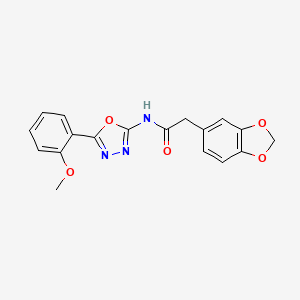 molecular formula C18H15N3O5 B2536883 2-(苯并[d][1,3]二氧杂环-5-基)-N-(5-(2-甲氧基苯基)-1,3,4-恶二唑-2-基)乙酰胺 CAS No. 922014-72-0