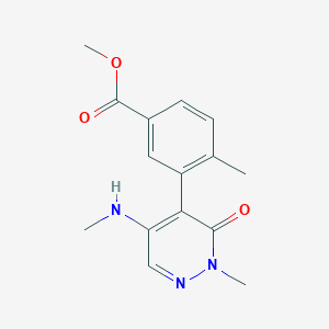 molecular formula C15H17N3O3 B2537013 Methyl 4-methyl-3-[2-methyl-5-(methylamino)-3-oxopyridazin-4-yl]benzoate CAS No. 2137758-17-7