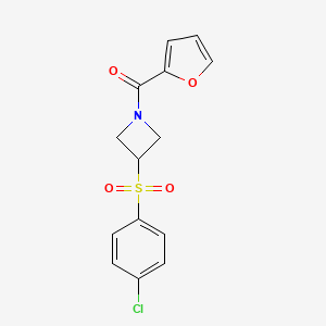 molecular formula C14H12ClNO4S B2537412 (3-((4-Chlorophenyl)sulfonyl)azetidin-1-yl)(furan-2-yl)methanone CAS No. 1448073-71-9