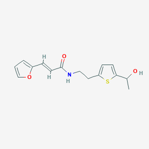 molecular formula C15H17NO3S B2537609 (E)-3-(furan-2-yl)-N-(2-(5-(1-hydroxyethyl)thiophen-2-yl)ethyl)acrylamide CAS No. 2035018-15-4