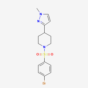 molecular formula C15H18BrN3O2S B2540451 1-((4-bromophenyl)sulfonyl)-4-(1-methyl-1H-pyrazol-3-yl)piperidine CAS No. 2034609-79-3