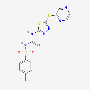 molecular formula C14H12N6O3S3 B2540610 2-({5-[({[(4-Methylphenyl)sulfonyl]amino}carbonyl)amino]-1,3,4-thiadiazol-2-yl}sulfanyl)pyrazine CAS No. 866042-93-5