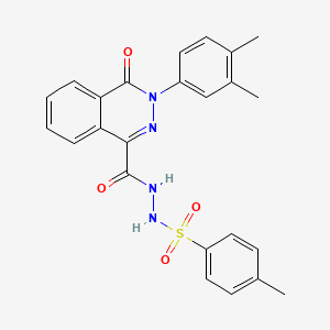 molecular formula C24H22N4O4S B2541040 N'-{[3-(3,4-dimethylphenyl)-4-oxo-3,4-dihydro-1-phthalazinyl]carbonyl}-4-methylbenzenesulfonohydrazide CAS No. 866039-07-8