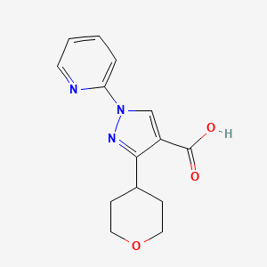 molecular formula C14H15N3O3 B2541377 3-(Oxan-4-yl)-1-pyridin-2-ylpyrazole-4-carboxylic acid CAS No. 2241128-20-9