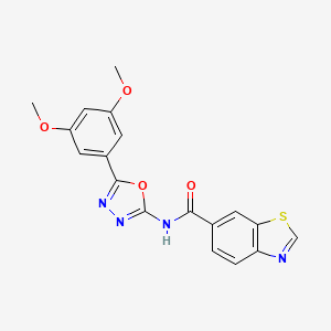 molecular formula C18H14N4O4S B2541466 N-[5-(3,5-diméthoxyphényl)-1,3,4-oxadiazol-2-yl]-1,3-benzothiazole-6-carboxamide CAS No. 865287-04-3