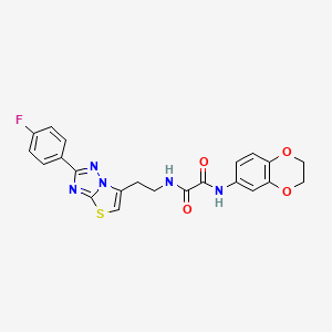 molecular formula C22H18FN5O4S B2541868 N1-(2,3-dihydrobenzo[b][1,4]dioxin-6-yl)-N2-(2-(2-(4-fluorophenyl)thiazolo[3,2-b][1,2,4]triazol-6-yl)ethyl)oxalamide CAS No. 894034-04-9