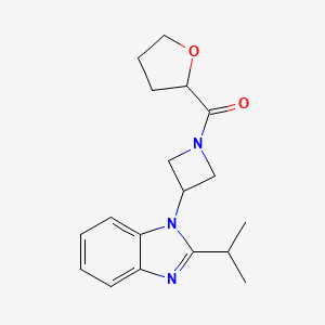 Oxolan-2-yl-[3-(2-propan-2-ylbenzimidazol-1-yl)azetidin-1-yl]methanone