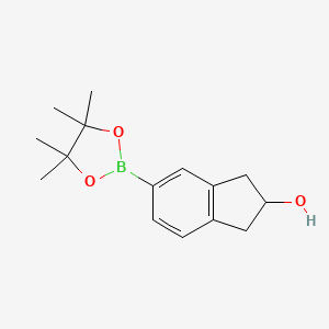 molecular formula C15H21BO3 B2542046 5-(Tetramethyl-1,3,2-dioxaborolan-2-yl)-2,3-dihydro-1H-inden-2-ol CAS No. 1857348-77-6