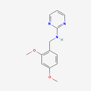 N-[(2,4-dimethoxyphenyl)methyl]pyrimidin-2-amine