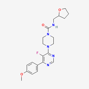 4-[5-Fluoro-6-(4-methoxyphenyl)pyrimidin-4-yl]-N-(oxolan-2-ylmethyl)piperazine-1-carboxamide