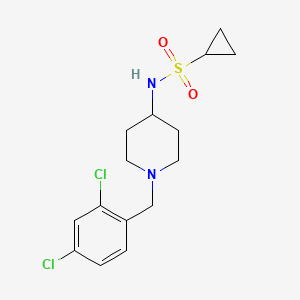 molecular formula C15H20Cl2N2O2S B2543666 N-{1-[(2,4-dichlorophenyl)methyl]piperidin-4-yl}cyclopropanesulfonamide CAS No. 2415603-76-6