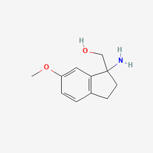 molecular formula C11H15NO2 B2543829 (1-Amino-6-methoxy-2,3-dihydro-1H-inden-1-YL)methanol CAS No. 1521074-74-7