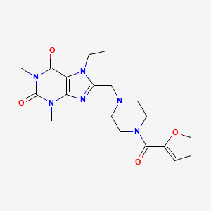 molecular formula C19H24N6O4 B2544004 7-Ethyl-8-[[4-(furan-2-carbonyl)piperazin-1-yl]methyl]-1,3-dimethylpurine-2,6-dione CAS No. 851937-45-6