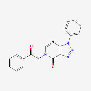 molecular formula C18H13N5O2 B2544076 6-(2-oxo-2-phenylethyl)-3-phenyl-3H-[1,2,3]triazolo[4,5-d]pyrimidin-7(6H)-one CAS No. 863018-71-7