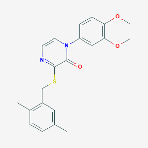 1-(2,3-Dihydro-1,4-benzodioxin-6-yl)-3-{[(2,5-dimethylphenyl)methyl]sulfanyl}-1,2-dihydropyrazin-2-one