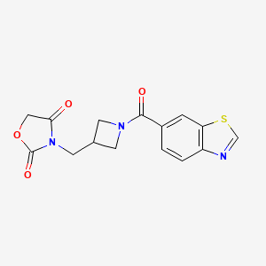 molecular formula C15H13N3O4S B2546104 3-((1-(Benzo[d]thiazole-6-carbonyl)azetidin-3-yl)methyl)oxazolidine-2,4-dione CAS No. 2034523-84-5