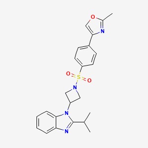molecular formula C23H24N4O3S B2546501 2-Methyl-4-[4-[3-(2-propan-2-ylbenzimidazol-1-yl)azetidin-1-yl]sulfonylphenyl]-1,3-oxazole CAS No. 2415584-14-2