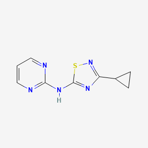 molecular formula C9H9N5S B2547989 3-Cyclopropyl-N-pyrimidin-2-yl-1,2,4-thiadiazol-5-amine CAS No. 2329282-78-0