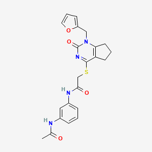molecular formula C22H22N4O4S B2548406 N-(3-acetamidophenyl)-2-((1-(furan-2-ylmethyl)-2-oxo-2,5,6,7-tetrahydro-1H-cyclopenta[d]pyrimidin-4-yl)thio)acetamide CAS No. 899747-49-0