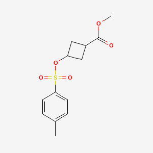 Methyl 3-{[(4-methylbenzene)sulfonyl]oxy}cyclobutane-1-carboxylate