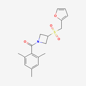 molecular formula C18H21NO4S B2548679 (3-((Furan-2-ylmethyl)sulfonyl)azetidin-1-yl)(mesityl)methanone CAS No. 1797020-37-1