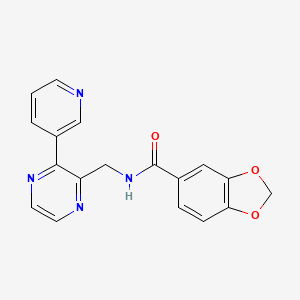 molecular formula C18H14N4O3 B2549409 N-((3-(吡啶-3-基)吡嗪-2-基)甲基)苯并[d][1,3]二噁唑-5-甲酰胺 CAS No. 2034317-54-7