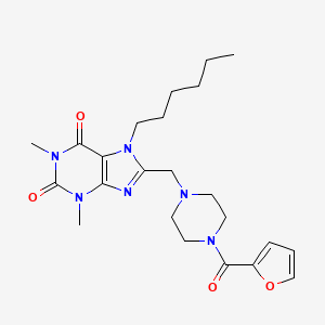 molecular formula C23H32N6O4 B2549746 8-((4-(furan-2-carbonyl)piperazin-1-yl)methyl)-7-hexyl-1,3-dimethyl-1H-purine-2,6(3H,7H)-dione CAS No. 851942-16-0
