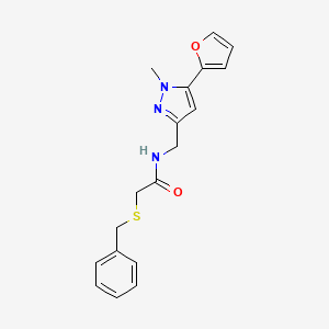 2-(benzylthio)-N-((5-(furan-2-yl)-1-methyl-1H-pyrazol-3-yl)methyl)acetamide