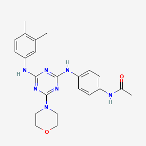 molecular formula C23H27N7O2 B2550484 N-[4-({4-[(3,4-dimethylphenyl)amino]-6-(morpholin-4-yl)-1,3,5-triazin-2-yl}amino)phenyl]acetamide CAS No. 898630-96-1